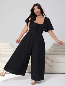 Solflare Bộ áo liền quần tay ngắn bồng bềnh đa năng, màu đen, cỡ lớn, phù hợp cho mùa Xuân/Hè 2026, thích hợp mặc hàng ngày, dự tiệc, hẹn hò, sinh nhật, lễ hội âm nhạc, đi học, đi làm, đi nghỉ mát. Kiểu dáng trễ vai, chất liệu cotton pha mềm mại, dáng rộng, dài. - màu đen - Xem 7