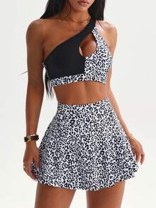 Dewbera 两件套女士运动服，纯色拼接豹纹印花，单肩吊带，露背设计，可拆卸带衬垫运动文胸和带口袋的豹纹短裤，适合日常休闲、跑步、瑜伽、健身、网球、高尔夫等运动。 - 彩色 - 查看 3