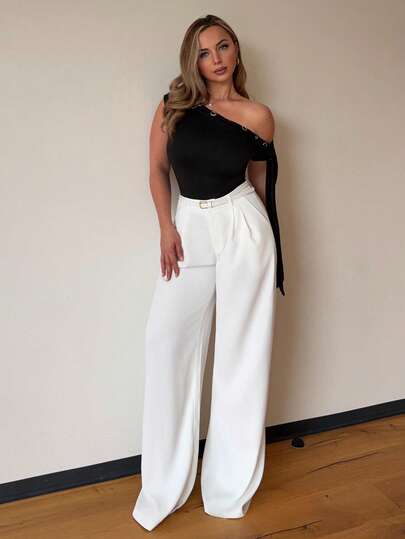 Jeta Ari 黑色鸡眼装饰不对称无袖纯色针织 T 恤