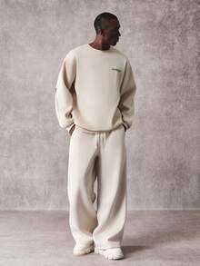 STYNVO 男士休闲时尚街头日常通勤字母印花保暖宽松圆领卫衣和阔腿运动裤套装，秋冬超大街头风 Jackpot 卫衣，男士超大街头风卫衣 - 杏色 - 查看 3