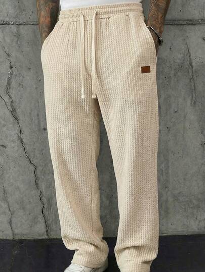 HIMLAND Men's Drawstring Waist Pocket Casual Pants With Graphic Design Waffle Knit Pants Men Cream Joggers Men Loungewear Pants Men Cream Pants Men Loose Pants Men