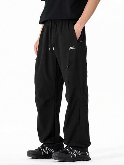 Manfinity Sport Corelite Pantaloni sportivi da uomo con vita con coulisse e tasche, vestibilità morbida, adatti per primavera/estate