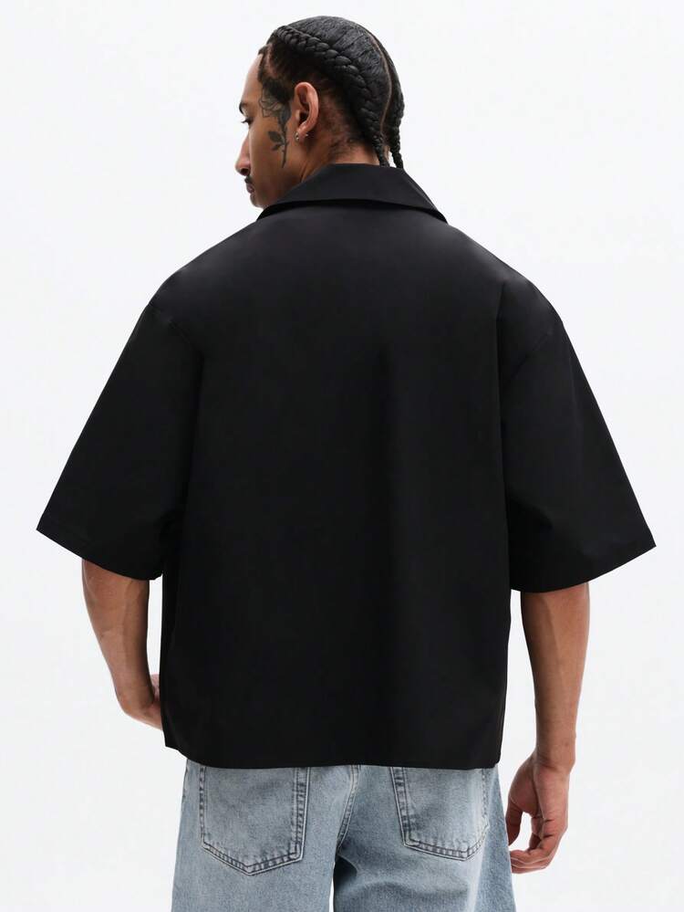 Koszula oversize zapinana na guziki z nadrukiem numerycznym