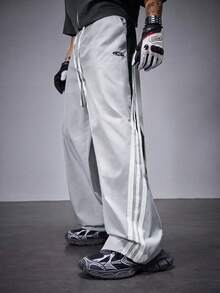 Manfinity RebelGame Męskie, jednokolorowe, sznurowane spodnie casualowe z łatkami z przodu, minimalistyczne do codziennego noszenia - Jasnoszary - Zobacz 1