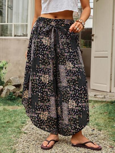 Freevana Plus Size Women Flower Print Elastic Waist Tie Hem Asymmetrical Hem Long Pants Vacation