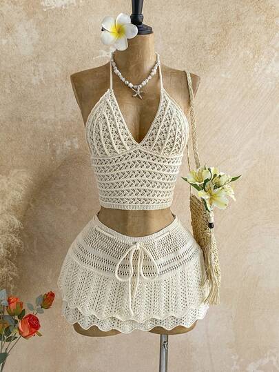 Soleia Set de 2 piezas con top halter sin espalda de unicolor y falda de punto anudada