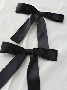 SHEIN Franclia Bộ đồ 2 mảnh mùa xuân mới, kiểu dáng giản dị, đa năng, thoải mái, gồm áo vest dệt kim trắng không tay cổ tròn, lưng hở, thắt nơ đen và quần short dệt kim rộng màu đen dành cho nữ. - Nhiều màu - Xem 4