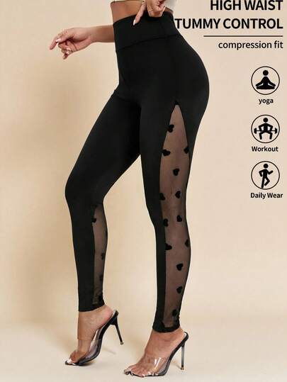 Amorya Svarta smala byxor för kvinnor, elastiskt stickat tyg med flockad lapptäcke, hjärtmönster, hög midja, lämpliga för höst/vinter och tidig vår