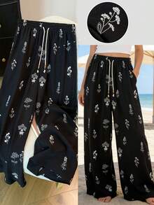 GlowEve CURVE 大码女式花卉刺绣宽松长裤，法式优雅女士通勤休闲运动服 - 黑色 - 查看 1