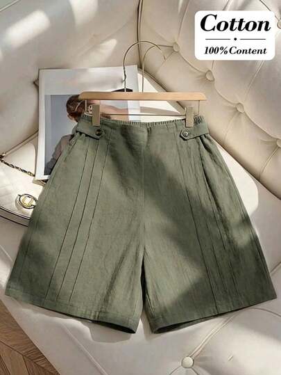 Miaspire These Elegant Women's Shorts Come In A Low-Saturation Military Green, Their Soft Texture Perfectly Complementing The Relaxed Atmosphere Of The New Year. The Floral Pattern Features A Solid-Color Pleated Texture, Exuding A Clean And Sophisticated Design Within Its Simplicity. The High-Waisted, Wide-Leg Design Is Accented With Gold Button Details For A Touch Of Refinement, And The Cotton-Like Fabric Is Comfortable And Skin-Friendly. Suitable For Spring And Autumn (With Long Socks) Or Early Summer, These Shorts Can Be Paired With A White Top For A Refreshing Look During The New Year, Or Layered With A Cardigan For Added Depth. They Are Also Suitable For Everyday Outings And Casual Gatherings, Offering A Relaxed Fit For A Casual Feel While Showcasing Understated Style With Their High-Quality Fabric. They Are A Versatile Piece In Your New Year's Wardrobe That Combines Comfort And Style.