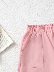 SHEIN Genkimix Kids Quần ống rộng dáng suông cho bé gái, màu hồng nhạt, thiết kế tối giản và nhẹ nhàng, cạp chun co giãn + túi tiện dụng, kiểu dáng mềm mại phù hợp cho hoạt động thể thao. Thích hợp cho các dịp xuân/thu như đi học, đi chơi, họp mặt gia đình, phong cách Hàn Quốc nhẹ nhàng. - Hồng - Xem 7