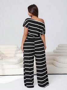 Solflare Plus Size Women Striped Asymmetrical Shoulder Short Sleeve Top And Tie Waist Wide Leg Pants Casual 2 Pieces Set - Black and White - View 2