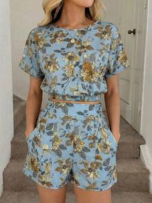 Easowa Bộ trang phục thường ngày thanh lịch in họa tiết hoa cổ điển dành cho nữ, thích hợp cho kỳ nghỉ, bao gồm áo cổ tròn cạp chun và quần short xếp ly có túi. - Màu xanh nhạt - Xem 4