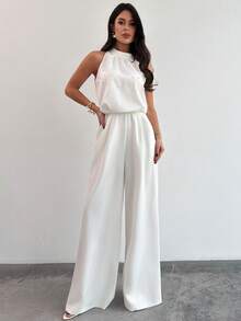 Firerie Quần ống rộng ôm dáng màu trắng không tay cổ tàu đính ngọc trai dành cho nữ, bộ jumpsuit trắng đính hạt lãng mạn, jumpsuit không tay, thời trang công sở, lễ tốt nghiệp, trang phục giáo viên, xuân/hè/thu, thanh lịch, đi làm, hẹn hò, tiệc tùng, lễ hội âm nhạc, mùa cưới, tốt nghiệp, dạ hội, biểu diễn, hòa nhạc, trang phục công sở, tựu trường, tiệc thường niên, sinh nhật nữ, trang phục ngày lễ - trắng - Xem 6