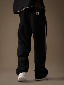 SUMWON 直筒修身，腰部褶裥设计，撞色滚边细节，现代正式商务休闲正装裤，适合办公室等专业场合穿着。 - 黑色 - 查看 3