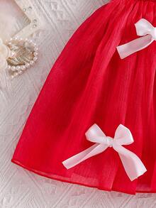 SHEIN 这款女宝宝优雅甜美休闲春夏3D蝴蝶结荷叶边短袖连衣裙，完美展现了优雅与俏皮的设计。无论是日常穿着、度假还是参加派对，都能让宝宝散发出优雅可爱的气质。 - 紅色 - 查看 6