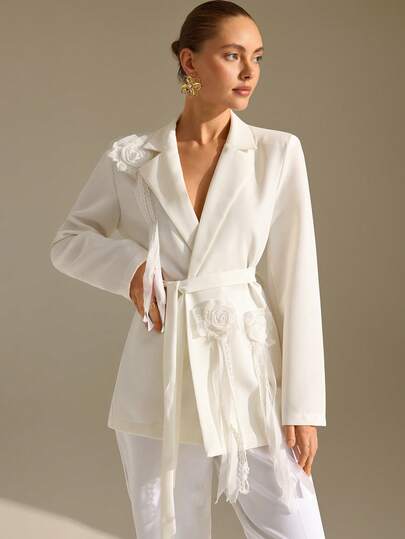 CLARA VERO White Floral Applique Belted Blazer: Tailored Fit And Feminine Shape, Ideal For Fashion Events Or Stylish Workdays, Crafted In Non-Elastic Double Layer Polyester Featuring Three-Dimensional Flower Embellishment And Self Tie Waist