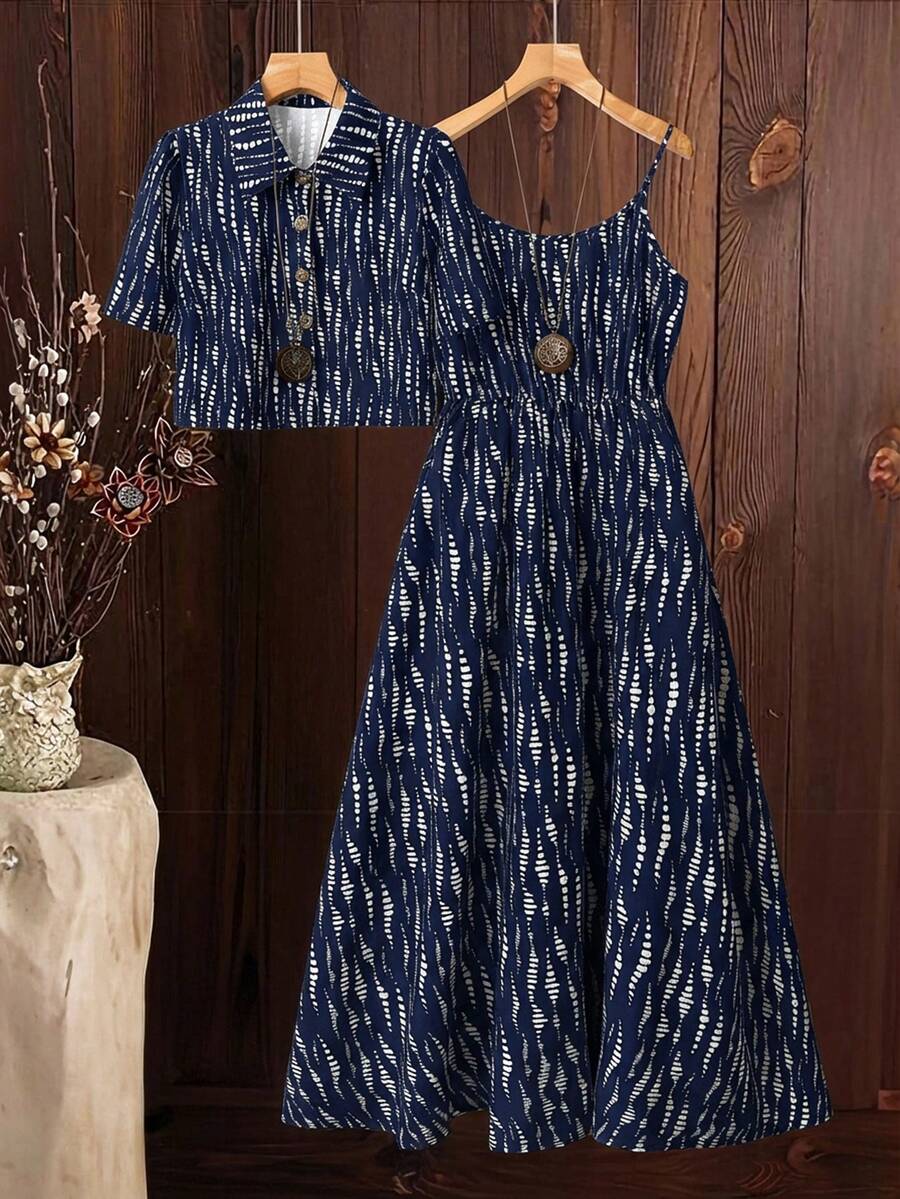 SHEIN Clasi Bộ đồ hai mảnh mùa hè gồm áo sơ mi cổ bẻ cài cúc thanh lịch và váy chữ A ôm eo in họa tiết, váy maxi hai dây in họa tiết với viền bèo nhún, thích hợp cho kỳ nghỉ biển. - Màu xanh hải quân - Xem 1