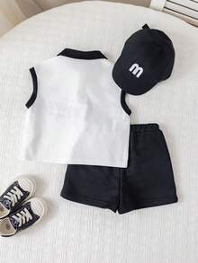 SHEIN Bộ 2 món áo polo tay ngắn và quần short phối màu cho bé trai, quần áo mùa xuân/hè, trang phục đường phố. - Đen và trắng - Xem 2
