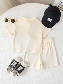 SHEIN 2 Stücke/Set Unisex Baby Jungen/Mädchen Lässig Süß Tier Muster V-Ausschnitt Kurzarm T-Shirt und Shorts Set, Frühling/Sommer Baby Kleidung Outfit - Aprikosenfarben - Übersicht 2