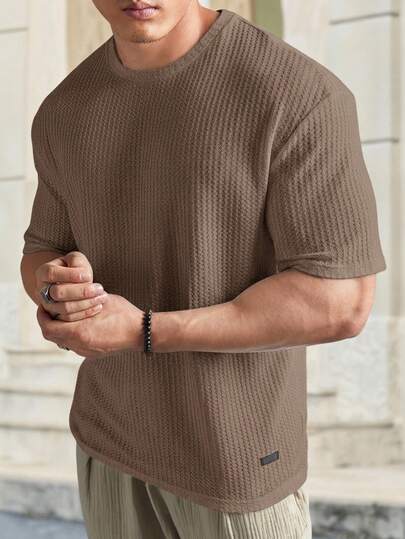 HIMLAND Camiseta de manga corta casual y versátil para hombres de cuello redondo y textura de gofre de unicolor