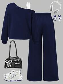 Bộ đồ thể thao mùa thu/đông cho bé gái, áo nỉ cổ chéo phối dây, vai bất đối xứng, nơ ngắn in họa tiết + quần ống đứng cạp chun cùng màu, 2 món phong cách tối giản thường ngày. - Màu xanh hải quân - Xem 2