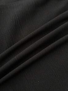 SHEIN Pantalón corto de falda de niña preadolescente de unicolor con textura tejida, informal para primavera/verano - Negro - Ver 6