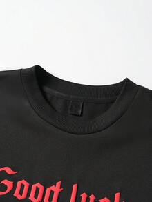 Manfinity Hypemode Camiseta de manga corta casual de cuello redondo con gráfico de letras y flores para hombres - Negro - Ver 3