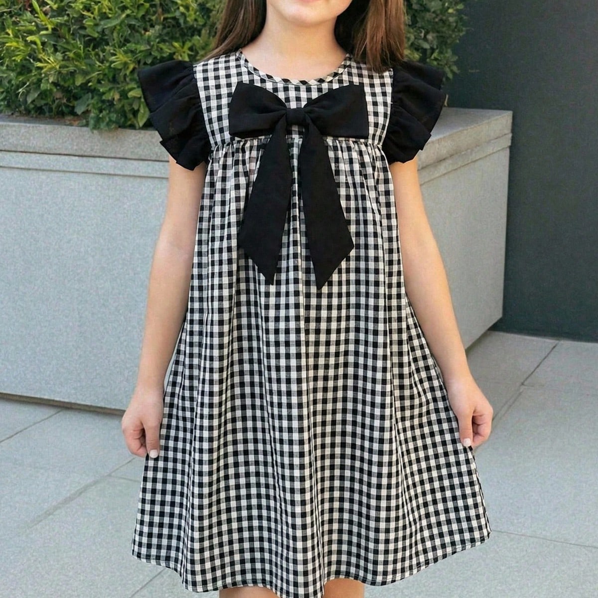 Vestido de línea A con mangas cortas y lazo a cuadros para niña preadolescente