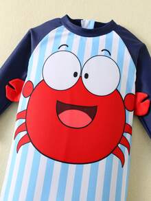 SHEIN Bubblio Áo tắm liền thân dài tay họa tiết cua dễ thương cho bé trai/bé gái, phối màu xanh sọc tương phản, thích hợp cho kỳ nghỉ, bãi biển, lướt sóng, đồ bơi dài tay cho bé trai. - Màu xanh lam - Xem 5