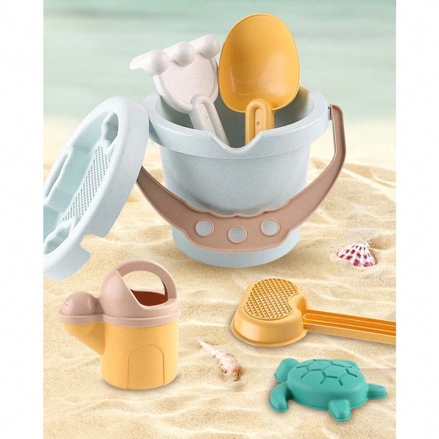 Un conjunto de juguetes de playa para niños, que incluye un set de cubos de playa, un cubo de arena reforzado y herramientas de excavación hechas de paja de trigo, un set de 9 piezas de juguetes interactivos de playa. - Multicolor - Ver 1