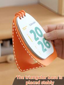 Zazumi 1. Lịch mini dạng lò xo hình nhân vật Pistachio năm 2026, thiết kế nhỏ gọn, tiện dụng để ghi chú nhanh, có nhiều màu sắc khác nhau, kiểu lật trang, dùng cho cả công việc và gia đình. - Nhiều màu - Xem 2