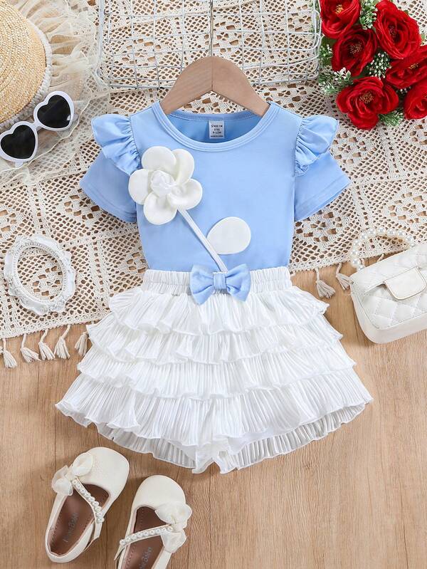 SHEIN Babygirl Cute Blue Knit Short Sleeve Floral Top And Ruffle Hem Shorts Set, Summer