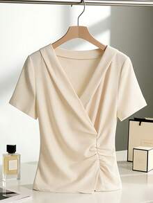 GlowEve Blusa blanca de verano elegante para oficina de mujer con cuello en V, plisada, manga corta, ajustada y corta, para uso diario, bodas, ir al trabajo, fiestas de graduación y citas - Albaricoque - Ver 1