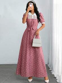 Modelyn Đầm hoa thanh lịch dành cho nữ, màu đen dệt họa tiết nơ, phối ren tương phản, tay ngắn, dáng chữ A, xếp ly, có thắt lưng. - Hồng - Xem 1