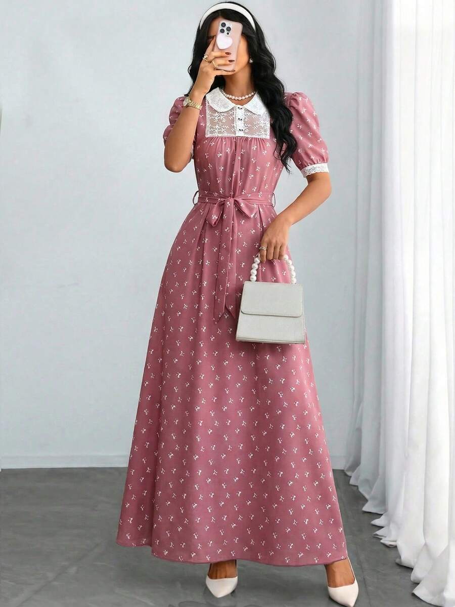 Modelyn Đầm hoa thanh lịch dành cho nữ, màu đen dệt họa tiết nơ, phối ren tương phản, tay ngắn, dáng chữ A, xếp ly, có thắt lưng. - Hồng - Xem 1