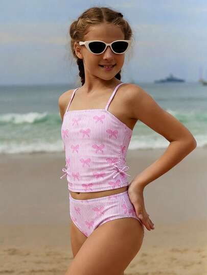 SHEIN New Tween Girls' Tankini Set, Pink Striped Bow Decor Spaghetti Strap Tankini Swimsuit, Fashion Casual Elegant Ladylike Sports Lively Cute Activewear, Suitable For Swimming, Beach, Pool, Photo Shooting, Gift Summer Vacation Thermal Christmas Holiday Festival New Years Valentines Swim Tween Bathing Suit Pink Girls Two Piece Bathing Tween Swimsuit Tween Pink Tankini Tween Girl Swimsuit Two Piece Beachwear For Tweens Two Piece Set Tween Pink Tankini Swimsuit Tween Bathing Suit Two Piece Girls Tankini Pink