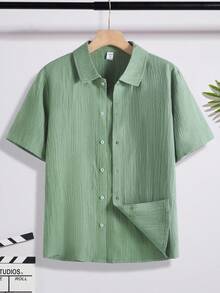 SHEIN Áo sơ mi nam tuổi teen tay ngắn, màu trơn, cài cúc phía trước, chất liệu vải có họa tiết, kiểu dáng thường ngày, thích hợp cho mùa hè. - xanh quân đội - Xem 7
