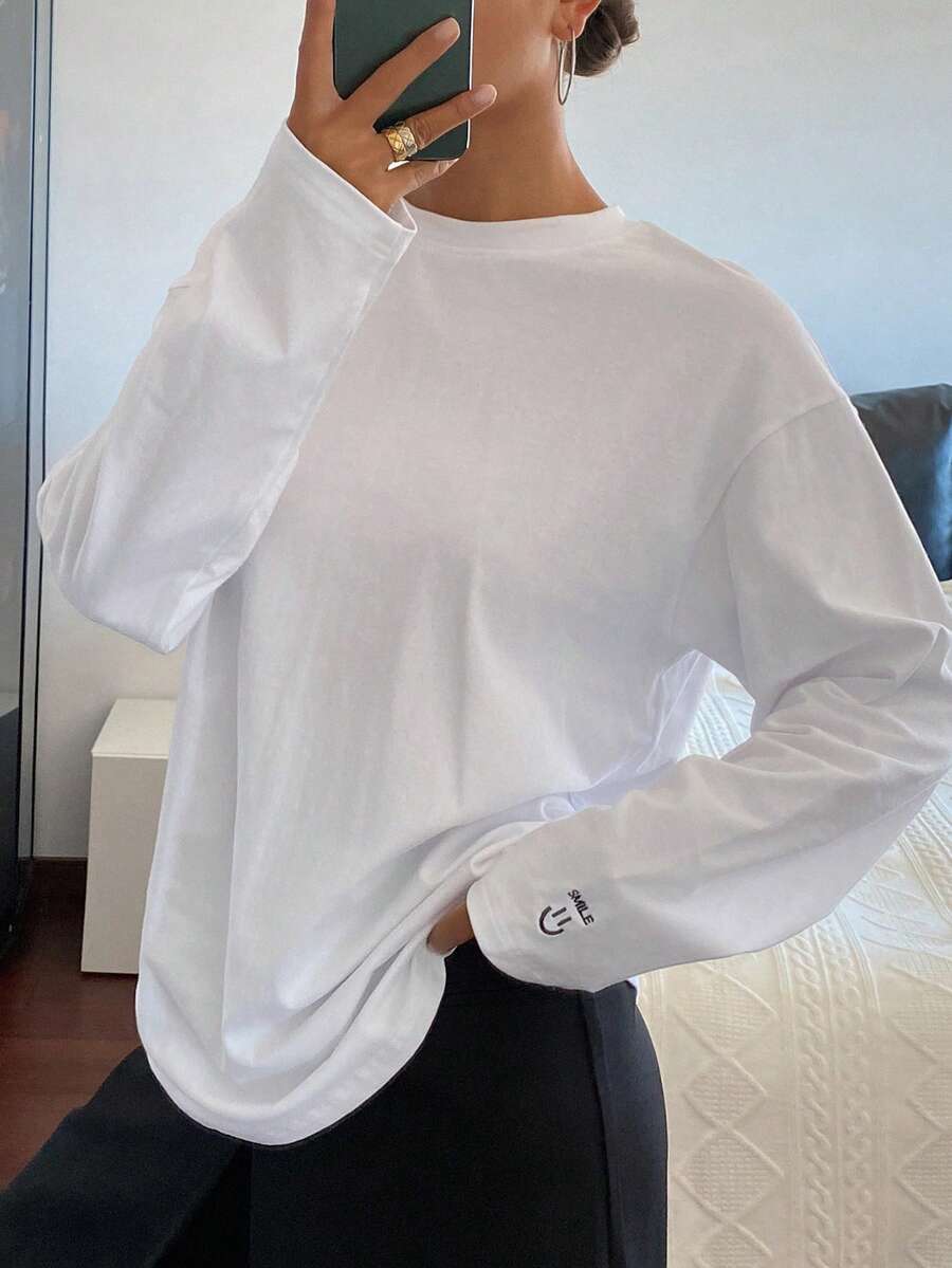 DAZY Women's Loose Fit Round Neck Long Sleeve Casual Sports T-Shirt With Graphic & Letter Embroidery, Spring/Autumn - White - View 1