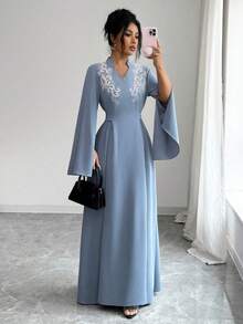 Al Najma Women's Elegant Minimalist Mandarin Collar Hand-Knitted Floral Embellished Long Sleeve Arabic Dress - Blue - View 5