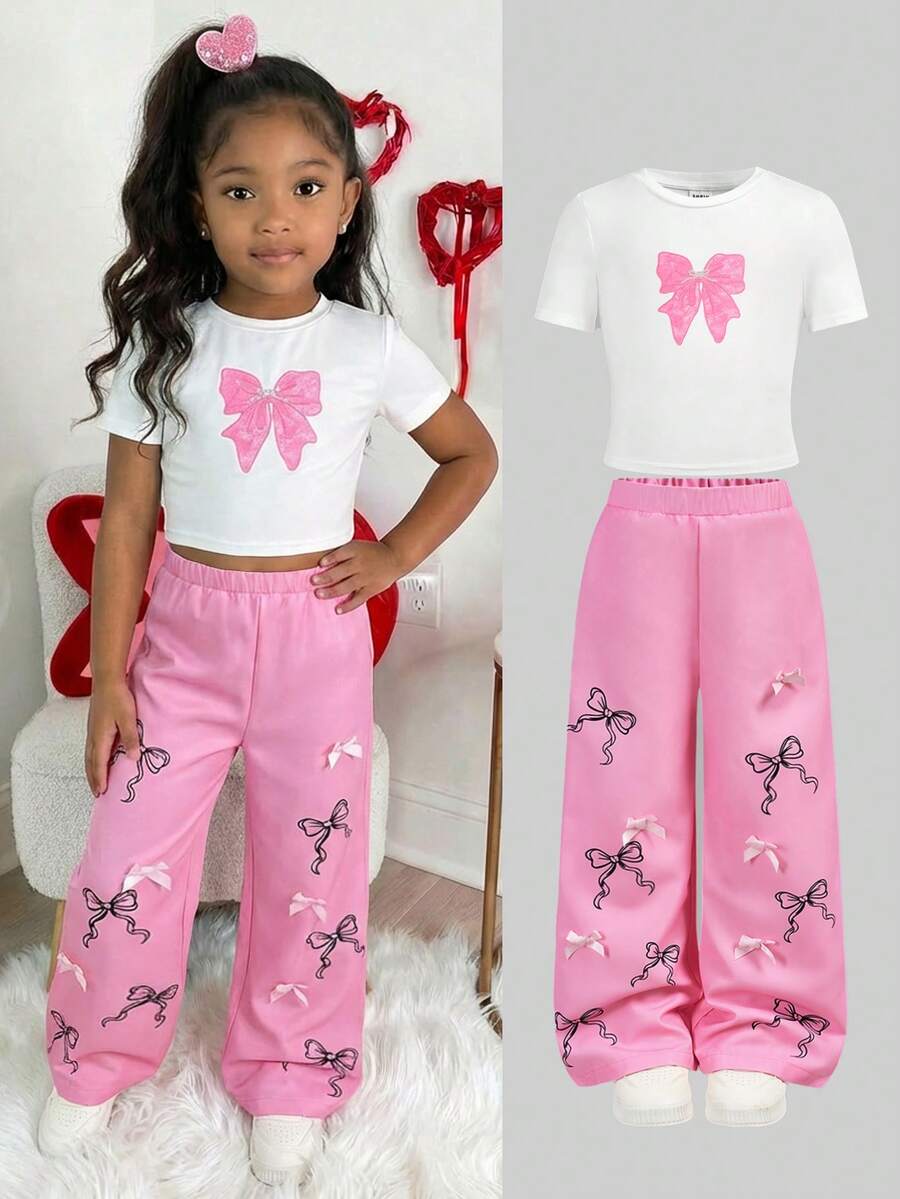 2 Stücke/Set Kleine Mädchen Weißes T-Shirt mit Schleifen Muster & Rosa Blumen Muster Hose, Lässig, Modisch, Vielseitig, geeignet für Ausflüge, Schwester Fotoshootings, Parkbesuche, Camping, Urlaub, Alltags Lässig Tragen - Verschiedenfarbig - Übersicht 1