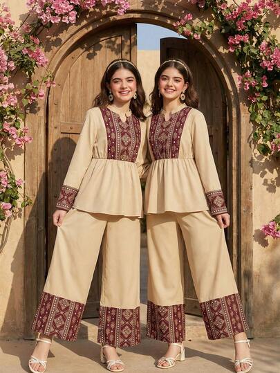 With A Light Apricot Color As The Base, Paired With A Rich Burgundy Embroidered Pattern, Creating A Distinct Yet Harmonious Visual Contrast. The Light Apricot Color Inherently Brings A Soft And Gentle Ambiance, Complementing The Skin Tone With A Refined Elegance; The Vintage Charm Of The Burgundy Color Then Infuses The Overall Ensemble With A Luxurious Flair, Allowing The Set To Stand Out Even In Everyday Wear. The Stand Collar Design Combined With The Delicate Front Embroidered Pattern Inherits The Elegant Charm Of Traditional Attire.