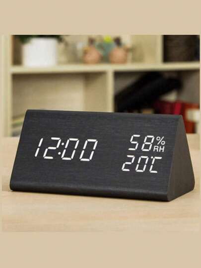ساعة تعرض الوقت والتاريخ والحرارة والرطوبة مع إمكانية ضبط السطوع. مناسبة للاستخدام في المنزل والغرفة والمكتب. هذه الساعة الإلكترونية الإبداعية ذات الشاشة LED تتميز بوظيفة الإضاءة الليلية والإنذار الصامت، مما يجعلها مثالية لاستخدام طلاب السكن الجامعي بجوار السرير. تعمل كساعة إنذار ليلية وساعة إلكترونية إبداعية