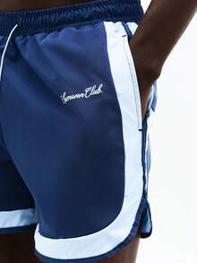 SUMWON Shorts de playa con rayas laterales y logotipo de texto para vacaciones de verano, natación y piscina - Azul - Ver 6
