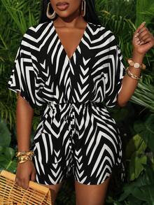 Slaydiva Bộ jumpsuit nữ mùa xuân hè kiểu dáng mới, thanh lịch, thoải mái, cổ chữ V, tay raglan, cạp chun, gấu quần chữ A, màu xanh navy, vải dệt họa tiết sóng trắng. - Nhiều màu - Xem 6