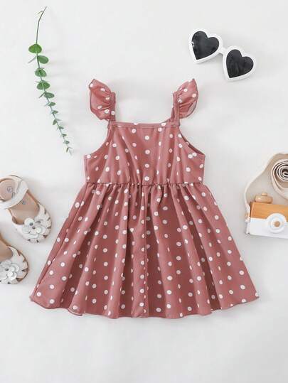 Vestido de verano elegante, versátil y lindo con estampado de lunares para niña