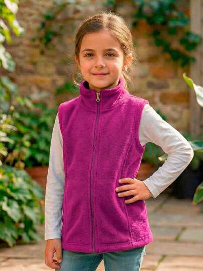 Chaleco afelpado tipo fleece con cierre completo y cuello alto. Abrigador, ligero y cómodo, ideal para niña