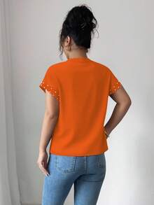 Elenzga 女士黑色圆领短袖T恤，饰有泡泡珍珠 - 橘色 - 查看 2