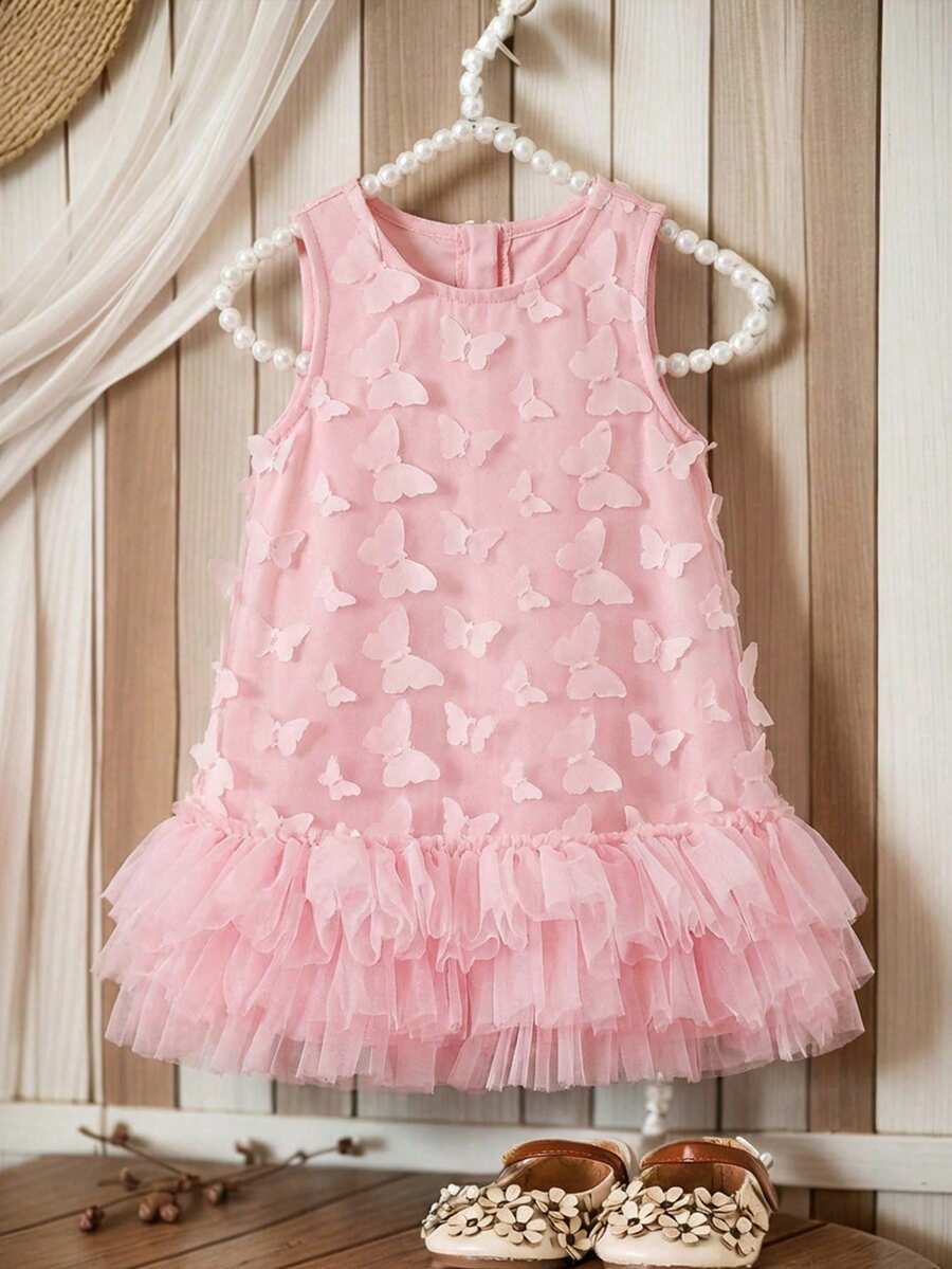 这款可爱的女婴休闲、简约、优雅的无袖连衣裙，带有 3D 蝴蝶提花网纱下摆，适合生日派对、晚宴、表演、婚礼、洗礼、开幕式、日常穿着、上学、郊游以及春夏季节。 - 粉色 - 查看 1