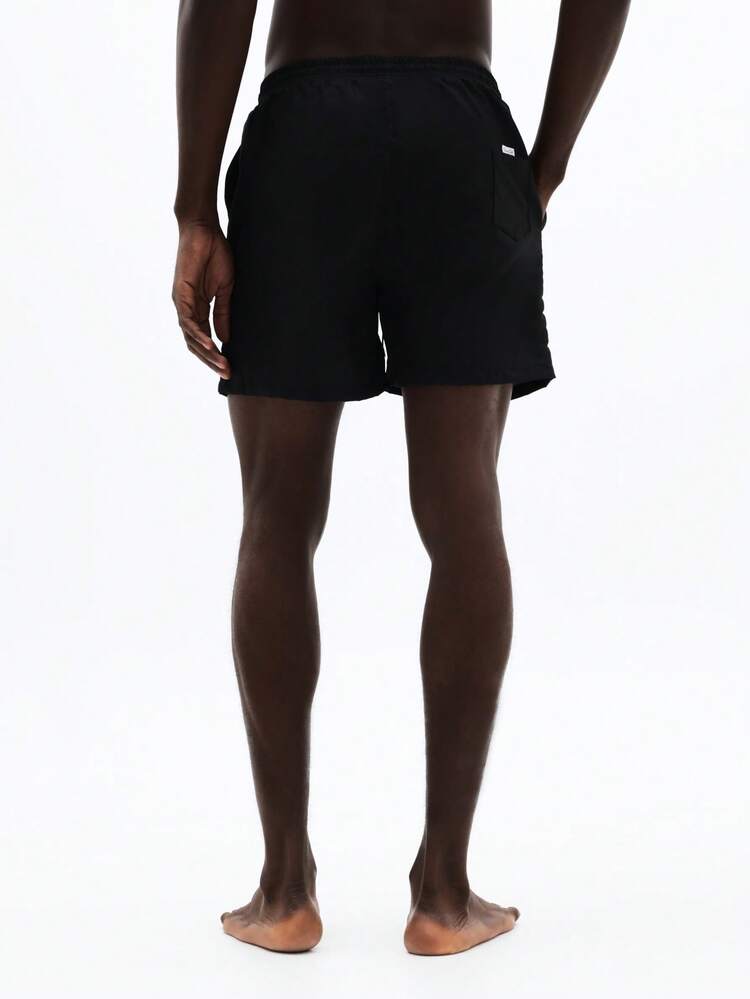 Spodenki kąpielowe z grafiką z tekstem Flame